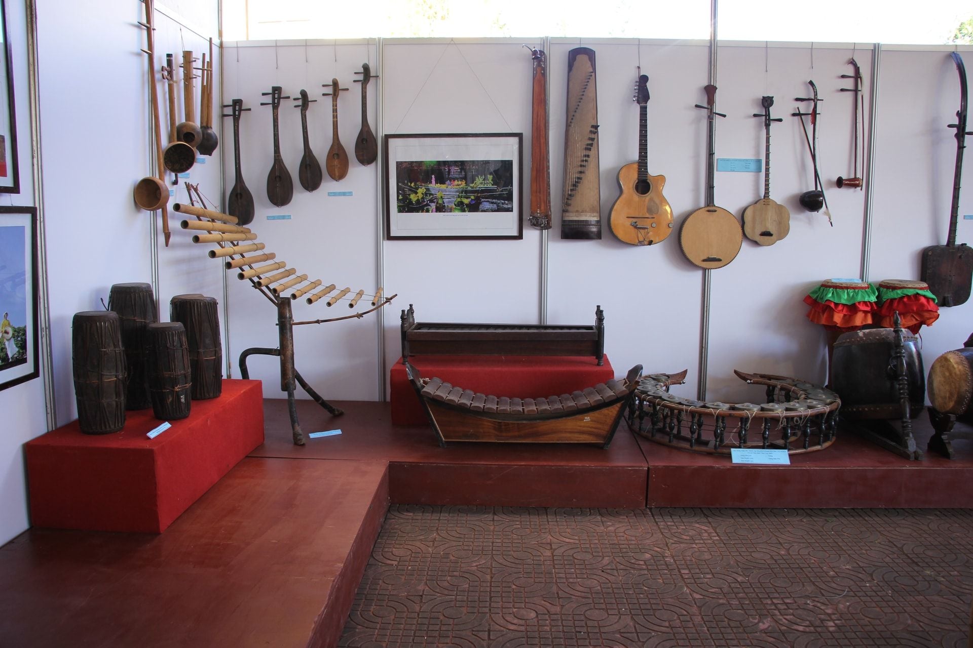 Ancient Vietnamese stone xylophone displayed in an archaeological museum setting